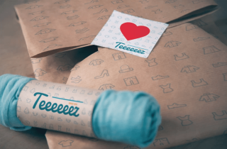 Free T-shirt Packaging Mockup Perspective View